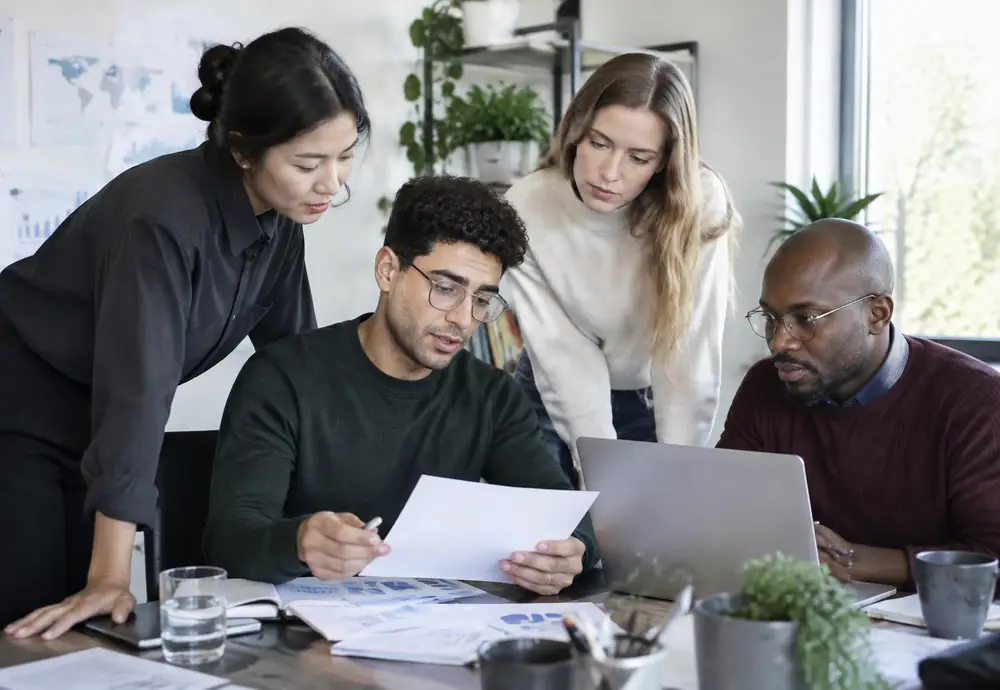 The Roofing Report USA research team reviewing contractor data
